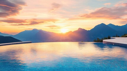 Fototapeta premium Luxury infinity swimming pool in a crescent shape reflects the beautiful sunset glow, with majestic mountains visible in the background, offering a serene atmosphere and photo style copy space.