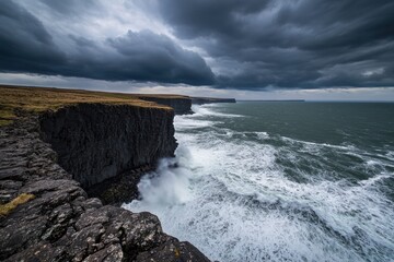Obraz premium Dramatic Coastal Cliffs Under a Stormy Sky