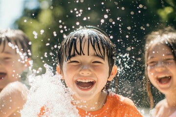 Fototapeta premium Happy Children Playing Joyfully In Splashing Water