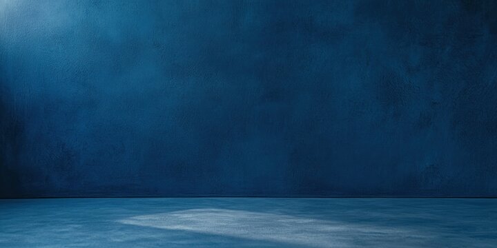 A deep, plain blue background that evokes professionalism and simplicity.