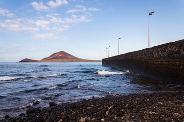 Montana Roja mountain on Tenerife coast near El Medano, Canary Islands, Spain, sunny summer day