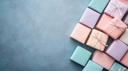 Colorful wrapped gifts arranged on a blue background create a visually appealing scene perfect for holiday or celebration-themed projects, invitations, or marketing materials,