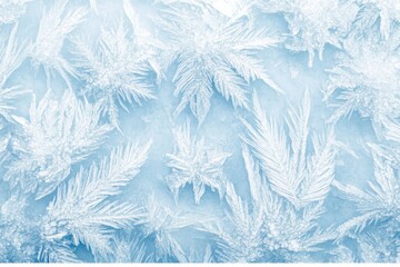 Winter frost creates intricate patterns on a glass surface in a chilly morning light