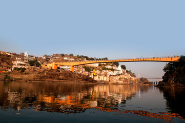 Obraz premium Omkareshwar temple and Omkareshwar city on banks of Narmada river, Madhya Pradesh, India,