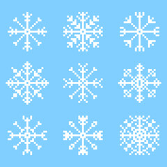 Pixel snowflakes set. A set of pixel snowflakes. Christmas New Year 8-bit style illustration.