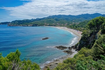 View of a beach and mountains from the top of a hill, ideal for travel or outdoor adventure scenes