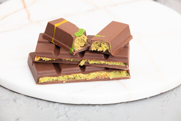 Dubai chocolate with green kataifi and pistachio paste. Trend dessert