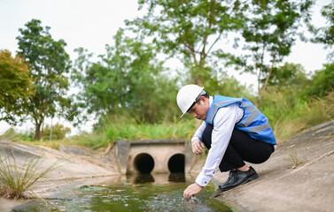 Water resources engineers are examining water samples from community sewers to determine the health...