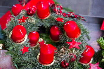 High angle view of advent wreath with red candles in front of grocery store at Swiss City of Zürich on an autumn day. Photo taken December 3rd, 2024, Zurich, Switzerland. 