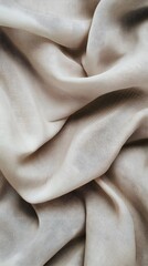 A soft and subtle background with the texture of woven fabric in neutral beige and gray tones.