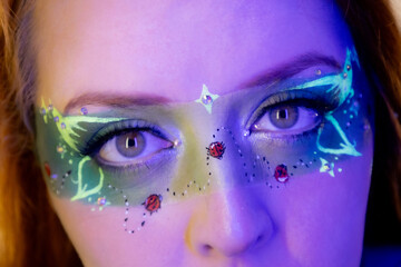 Portrait of a model with a fantasy nature makeup