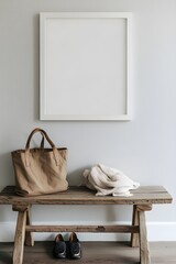 A simple white frame seen at an angle, hanging above a wooden bench with shoes and a bag adding natural clutter.