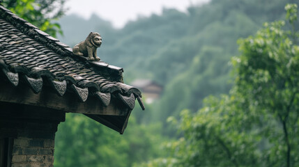 Lion statue on traditional Chinese roof with misty mountains in background showcasing classic architecture and serene nature atmosphere