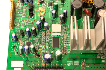 Close-up of a circuit board with microcircuits from an electrical appliance or computer. Selective...