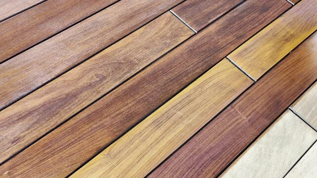 Deck wood stain application with a brush