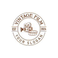 Obraz premium Hand drawn vintage style film production logo design template with vector illustration 