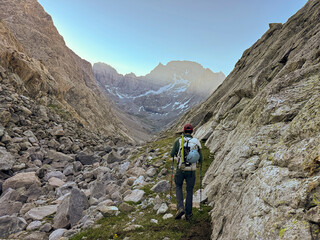 A young man enjoys a backpacking trip in the Wind River Range of Wyoming.