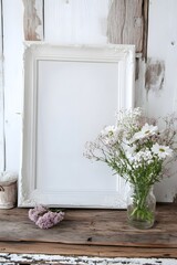 A blank white frame sitting on a rustic wooden dining table, accented with fresh flowers in a vase and natural textures.
