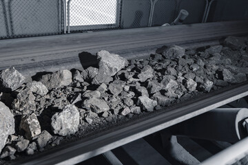 Belt conveyor in underground tunnel of concentrating plant. Transportation of ore to surface factory