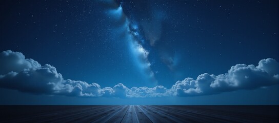Empty stage set against a backdrop of starry sky with blue cloud cover