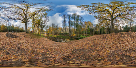 seamless spherical 360 hdri panorama in middle of oak forest near an abandoned pond or lake in...