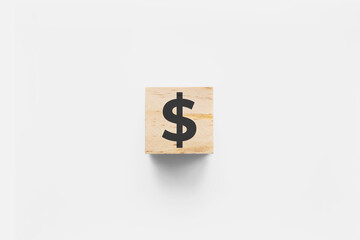 $ (Dollar) wooden cube on white background