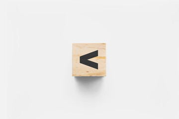 < (Less Than) wooden cube on white background