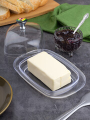 Dish with block of tasty butter