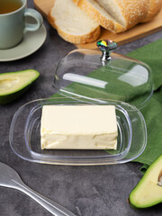 Dish with block of tasty butter