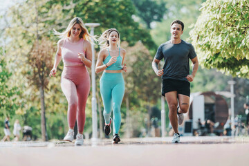 Three friends are jogging in a lush park, enjoying a sunny day and staying fit. The atmosphere is vibrant and energetic, highlighting health and friendship.