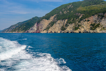 Obraz premium coastal landscape with blue sea and beautiful cliffs an mountains