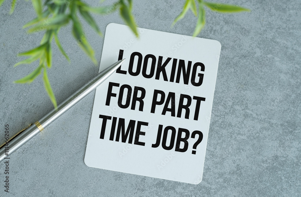 Poster looking for part time job - words on a paper notebook with pen on gray background.