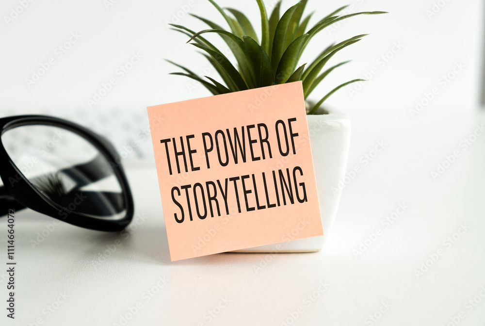 Poster holding a card with text the power of storytelling, business concept image with soft focus backgroun