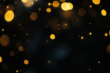 Soft golden bokeh lights on a black background, giving a magical, glowing effect with rich contrast.