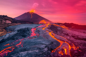Fototapeta premium Majestic volcanic eruption displays flowing lava against a vibrant twilight sky in El Salvador