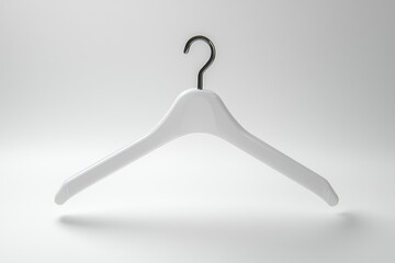 White plastic clothes hanger isolated on a plain white background