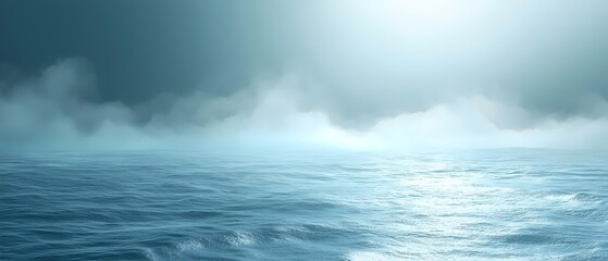 Fototapeta premium A serene seascape captures the calm of the ocean with soft blue hues and gentle waves, enhanced by a misty atmosphere and ethereal lighting.