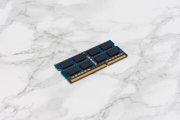 Blue computer RAM Sticks sits on a white countertop