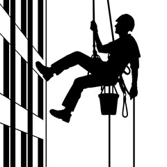 Silhouette of a rope access technician working on a building facade suspended by ropes © Formatoriginal