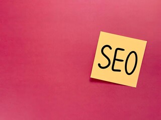 The word seo is written on the paper. promotion and analytics of work. marketing strategy. Office...