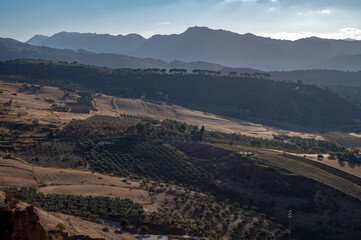 Panoramic view on green valley and mountaons aboud Ronda white willage, Andalusia, Spain