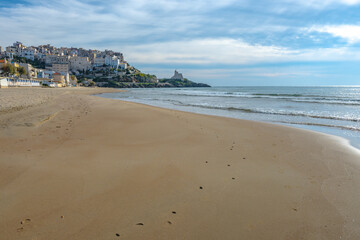 Sandy beach of medieval small touristic coastal town Sperlonga and sea shore, Latina, Italy