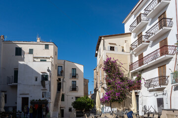 Fototapeta premium White old houses and narrow streets in medieval small touristic coastal town Sperlonga, Latina, vacation in Italy