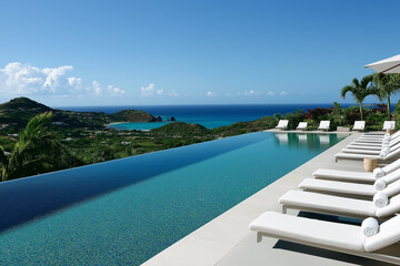 Fototapeta premium Traumhafte Poollandschaft mit Meerblick und modernem Design