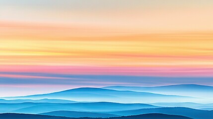  A stunning sunset view of a mountain range from the peak of a hill, with a plane soaring in the sky