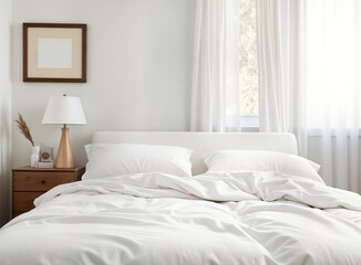 White bedding neatly arranged on white bed. White duvet cover, pillows displayed in bedroom. Simple wooden nightstand next to bed. Poster frame mockup on wall. Room bright, airy with light white