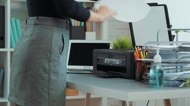 Organizing a modern office workspace with effective desk setup tips and efficient printer usage for productivity