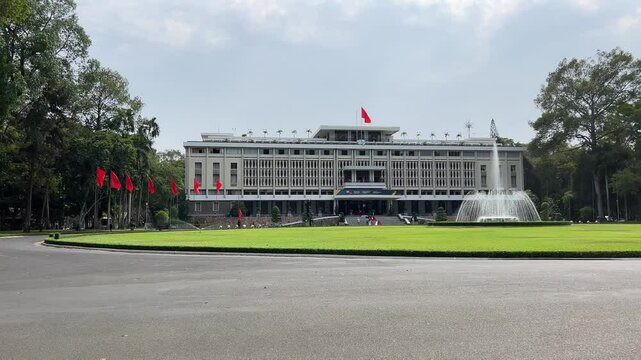 Frontal perspective of Independence Palace or Reunification Palace Dinh Doc Lap is designed main public landmark in the afternoon by architect. Ngo Viet Thu