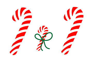 Three red and white candy canes on isolated background. Perfect for seasonal themes, Christmas cards, or festive advertising. 