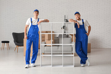 Loaders with shelving unit at home on moving day